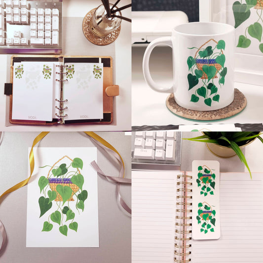 Heart Leaf Philodendron 4-Piece Stationery bundle that in cludes an A6 Notepad, 11oz Coffee Mug, A5 Postcard, and a Bokmark