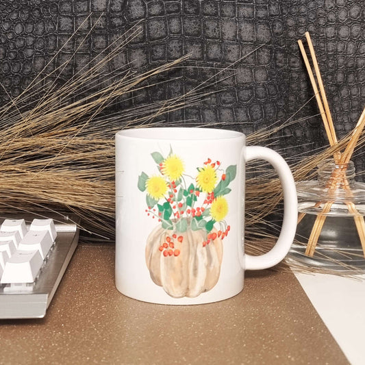 11oz Coffee mug with yellow Chrysanthemum flowers, Rose-Hip and Eucalyptus in a rustic pumpkin vase illustration on it